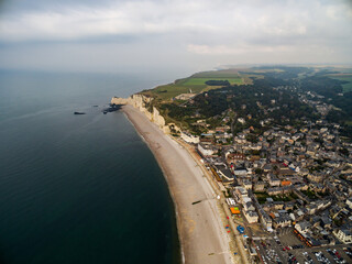 Aerial. Panorama ville et falaise d'Etretat. View Of Town By Sea. Étretat panorama. Normandie....
