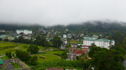 Houses and buildings on the slopes of the mountains in the town of Nuwara Eliya. Sri Lanka.