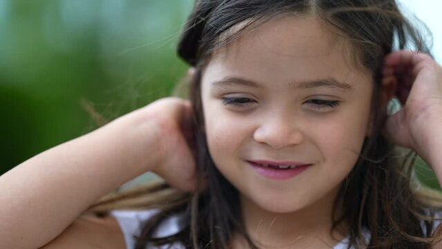 Adorable small girl portrait face with milk teeths missing smiling child