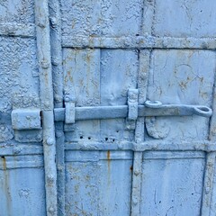 Antique bolt on a metal gate