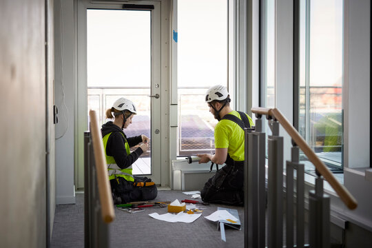 Workers At Building Site