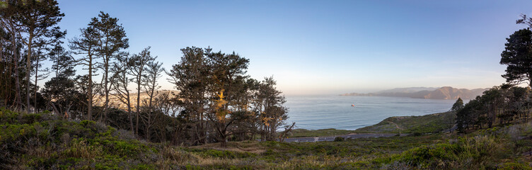 sunrise in San Francisco seen from Presidio park with bay view