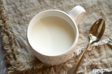 Probiotic kefir in a white cup on a table