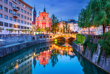 Ljubljana, Slovenia. Cathedral and Triple Bridge , twilight blue hour