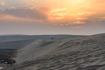 Sunset over Sealine sand dunes, Qatar, Middle East