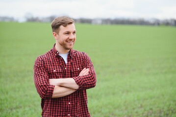 portrait of a young farmer in a field