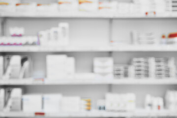 What a selection. Shot of a shelf full of medication and medication boxes all neatly placed next to each other in a pharmacy.