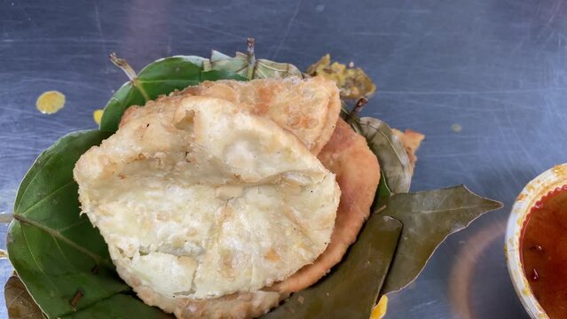 Hing Kochuri, kachori of kachauri is a spicy snack, fried dumpling and a very popular street food in India.
