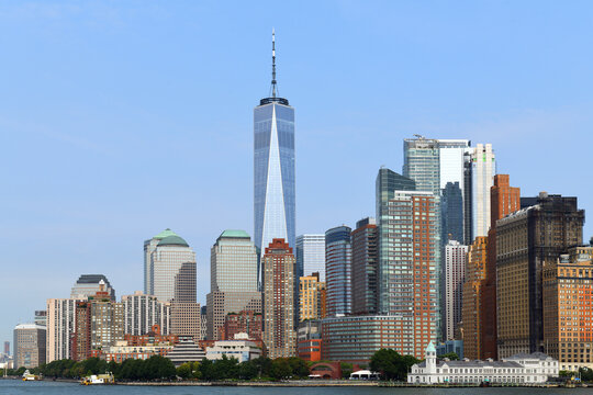 Lower Manhattan Skyline in summer. Skyscrapers and Towers with One World Trade Center became signature of New York skyline