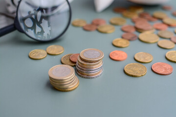 Counting the last coins left in the piggy bank