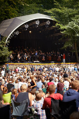 Ready for the show. Rearview shot of a crowd watching a band on stage.