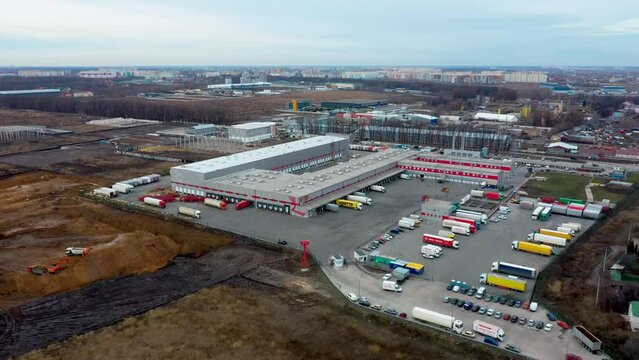 Aerial View Of Mail Delivery Terminal, Aerial View Of Cargo Terminal Of The Postal Service, Truck On The Industrial Warehouse, Distribution Warehouse With Trucks Awaiting Loading 