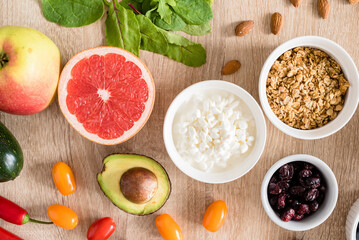 Healthy food concept. Cottage cheese, fruits, vegetables, leaf vegetables, berries, dried fruits...