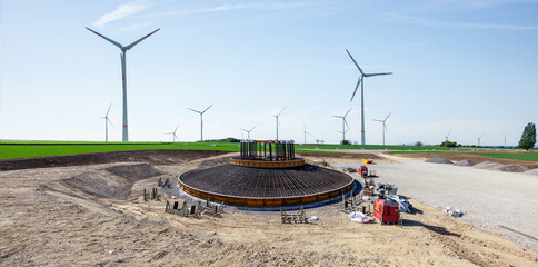 Construction site. Foundations of wind turbines with concrete and steel. building wind turbines....