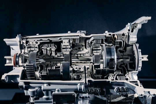 Longitudinal section mock-up of automobile gearbox for visual action and operation of gears on shaft
