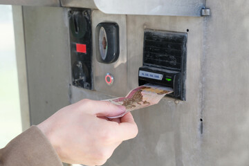 Bill acceptor for Russian rubles at a self-service car wash