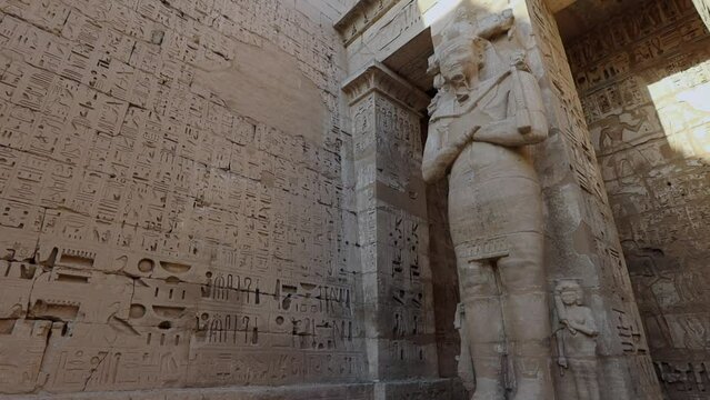 Statues in the Ancient Egyptian Temple of Medinet Habu, Luxor
