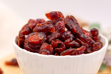 red cranberry dried in container prepare sevre healthy food.