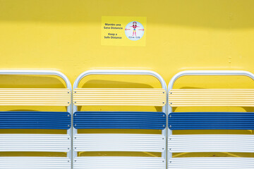 "Keep a safe distance" warning in English and Spanish on a passenger ship in Cancun, Mexico