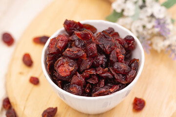 red cranberry dried in container prepare sevre healthy food.