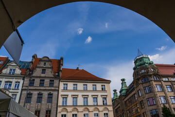 Low angle view of buildings on urban street in Wroclaw