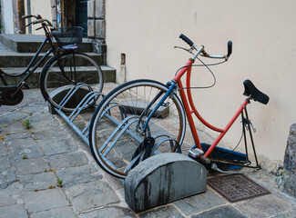 Fototapeta na wymiar bicycles in the street, Lucca, Italy