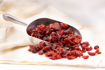 red cranberry dried in container prepare sevre healthy food.