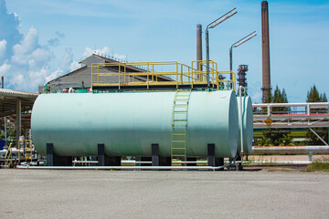Fototapeta na wymiar Storage tank whites of fuel oil in the horizontal tanks