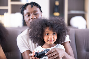 African American daddy play game with daughter, Black African family, Happy African American dad and kid daughter