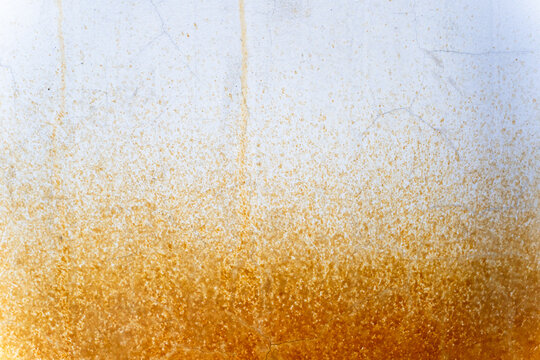 abstract rust splatter, thin cracks on white background. gradient distribution