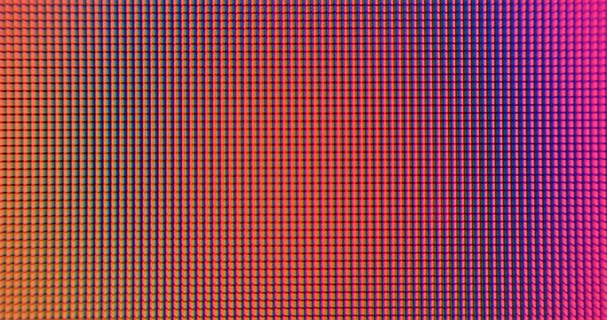 Smooth change of monitor color points in macro. From blue to orange, pink, palette dynamics. Video background, pastel colors.