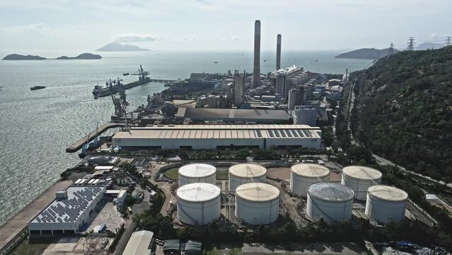 An aerial view of petrochemical industry in sunny morning , Hong Kong coal power station and oil tank of Tuen Mun.