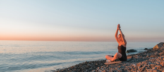 sport fit outdoor sea.girl goes sports,fitness,yoga seashore.Meditation, relaxation, mental...