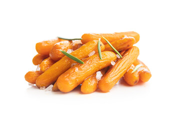 Roasted baby carrots with salt and rosemary isolated on white background.