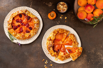 Apricot and raspberry galette, pie, cake with almond. Summer food.
