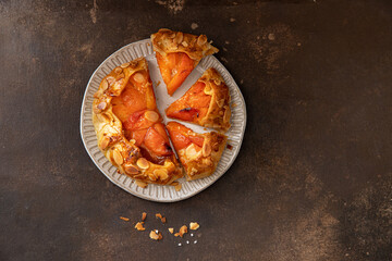 Apricot  galette, pie, cake with almond. Summer food.