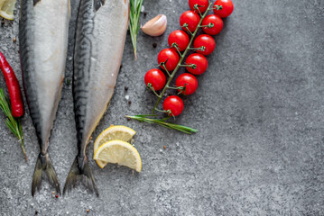 raw mackerel on stone background with copy space for your text