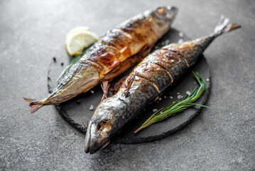 baked mackerel on stone background 