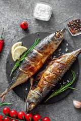 baked mackerel on stone background 