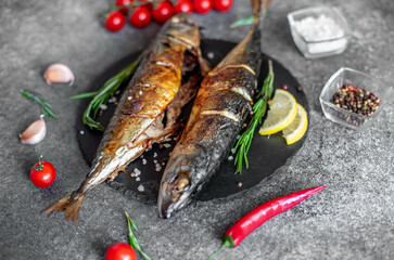 baked mackerel on stone background 