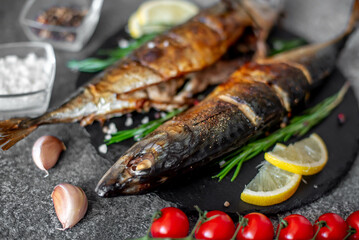 baked mackerel on stone background 