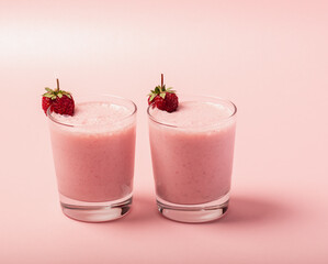 Fresh strawberry milkshake garnished. Cool summer drink. Selective focus.