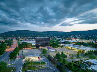 Late afternoon, early evening aerial image of Corning NY looking southwest toward the city	