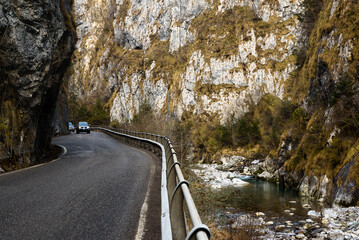 Colere, Province of Bergamo - 01 03 2022: The Via Mala opens its way into the mountain coast in a...