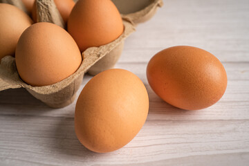 Organic fresh eggs in cardboard container pack, organic healthy food.