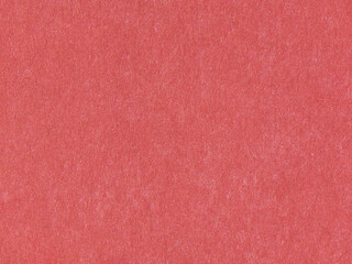 Macro natural texture of red paper or grunge background. A sheet of red paper. Rough textured surface. Wallpaper for your luxury design