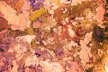 Texture of old concrete wall with cracked paint. Abstract orange background
