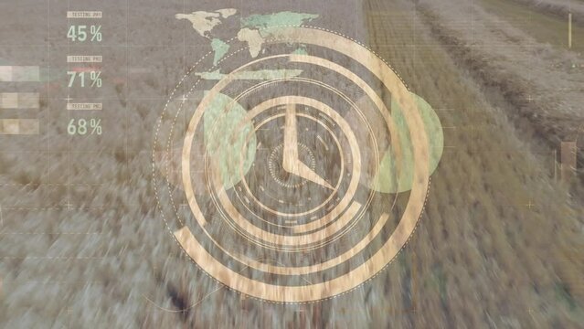 Animation of clock moving over graphs and wheat field