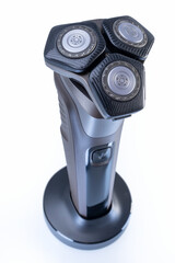 Electric shaver closeup on white background