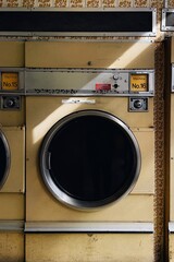 Old vintage coin-operated laundrette washing machine